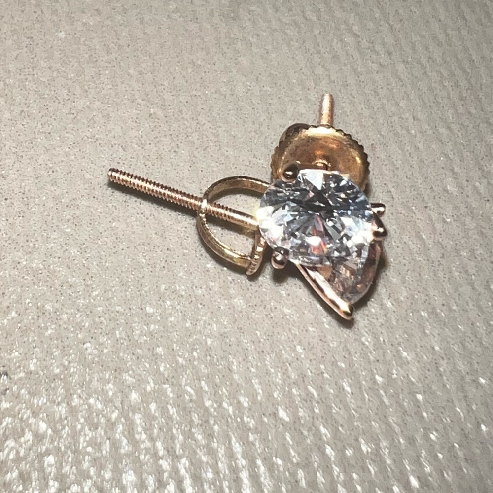 New 14k solid rose gold Studs with lab created diamond. About 2ct